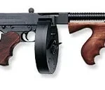 Thompson T1100D 1927A-1 Deluxe Carbine 45 ACP Caliber with 18" Barrel, 20+1 Capacity (Stick), 100+1 Capacity (Drum), Blued Metal Finish, American Walnut Stock Wood Grip Right Hand | Elite Firearms
